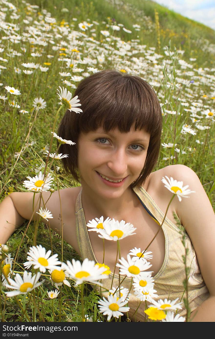 The portrait of girl in the middle of flower (bank of river). The portrait of girl in the middle of flower (bank of river)