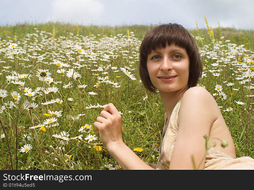 The portrait  of girl in the middle of flower (bank of river)