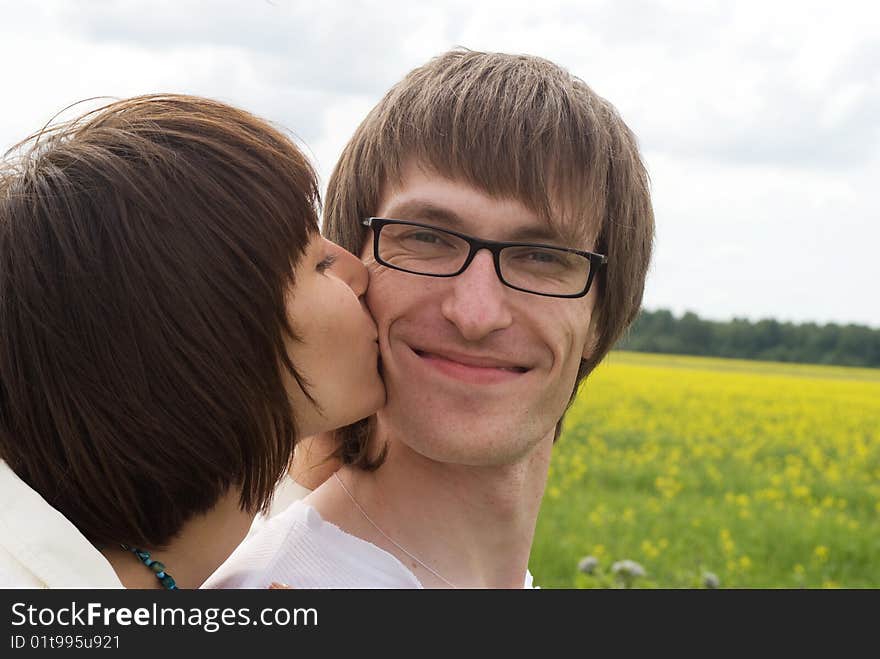 Boy and girl on a green grass. Boy and girl on a green grass