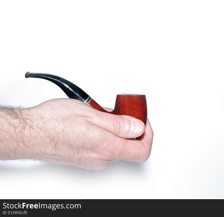 Pipe in palm on white background