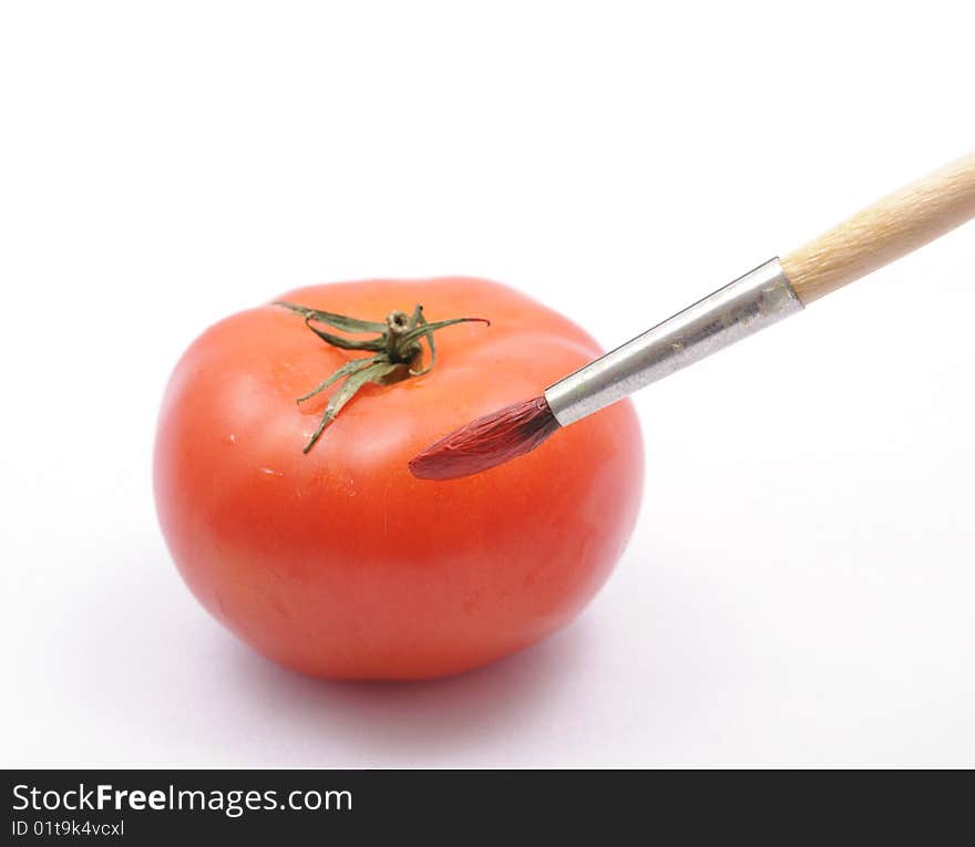 Coloring the tomato by brush. Coloring the tomato by brush