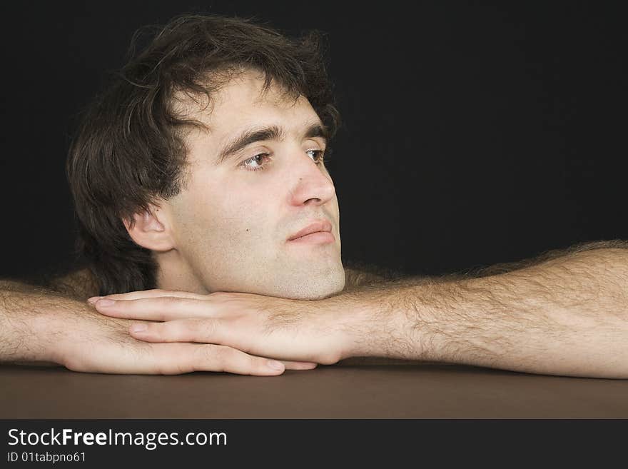 Portrait of a serious young man.  Black  isolated. Portrait of a serious young man.  Black  isolated.