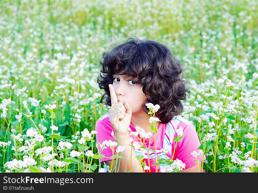 Adorable girl on grass