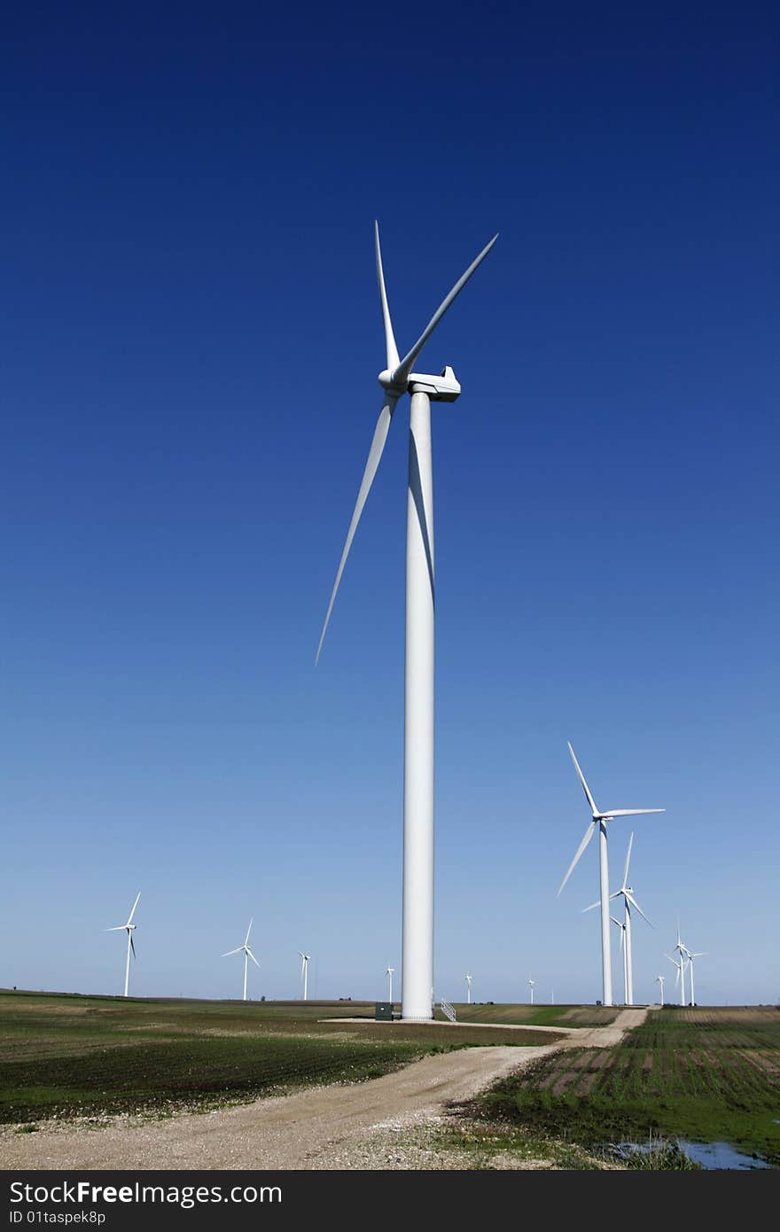 Wind turbine on dirt road