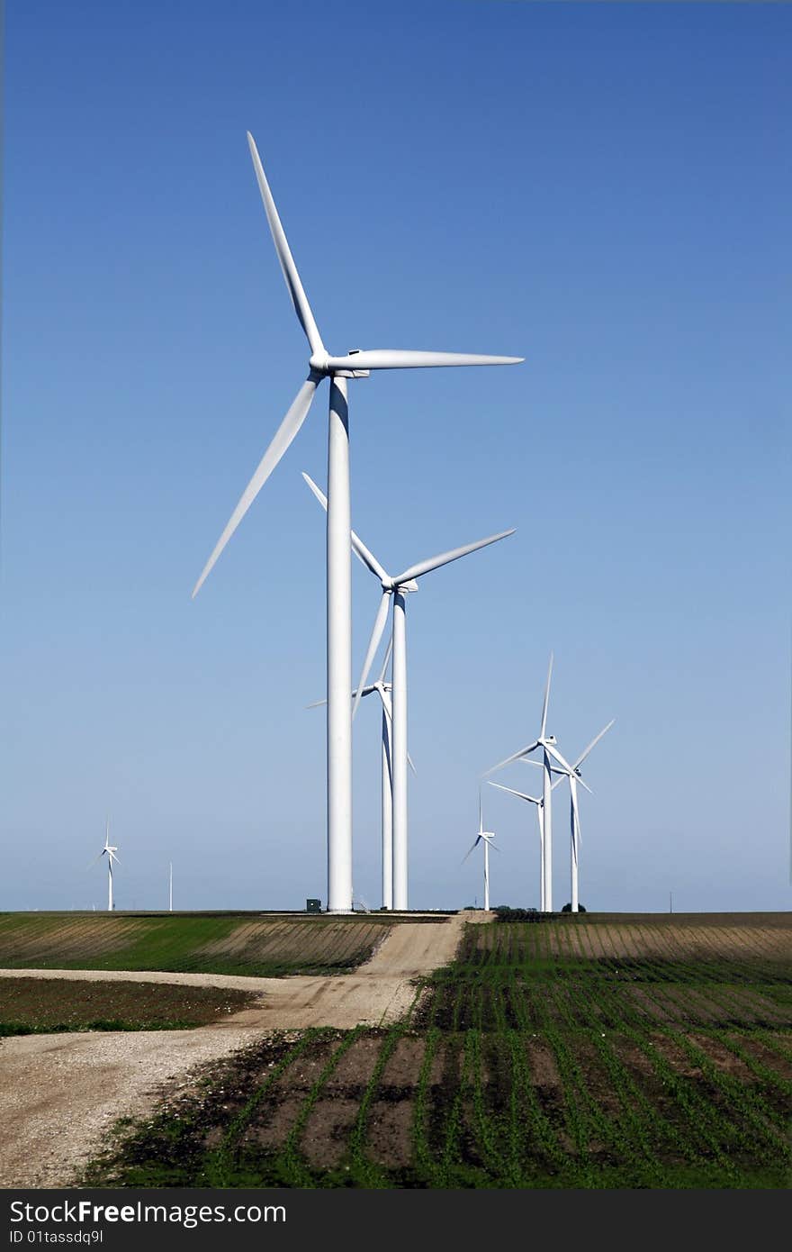 Wind turbine on dirt road