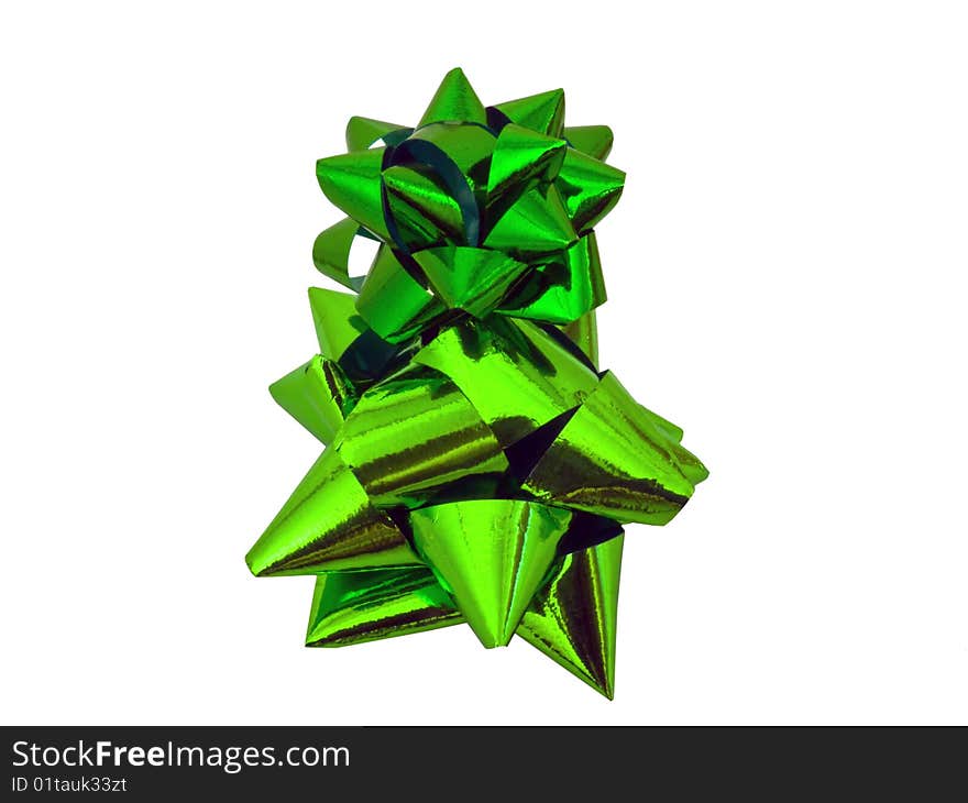 This is an isolated green gift bow used on parcels, gifts or packages for birthdays, christmas and other such celebrations. This is an isolated green gift bow used on parcels, gifts or packages for birthdays, christmas and other such celebrations.