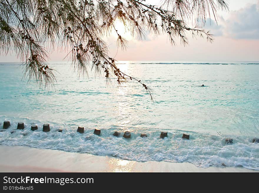 Soft light of sunrise on tropical beach