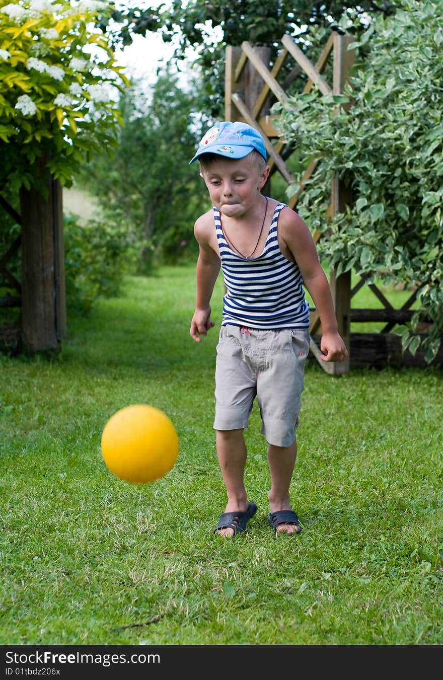 The boy with a ball.