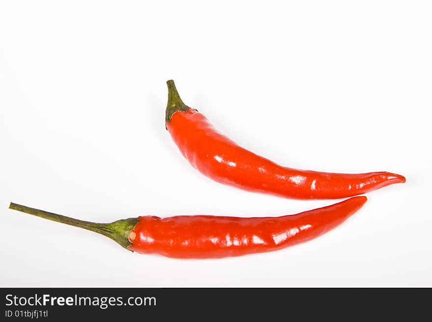 Red hot chili pepper on the white background