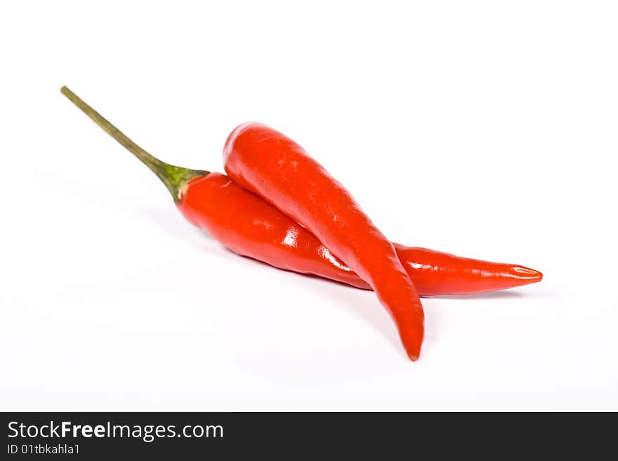 Red hot chili pepper on the white background