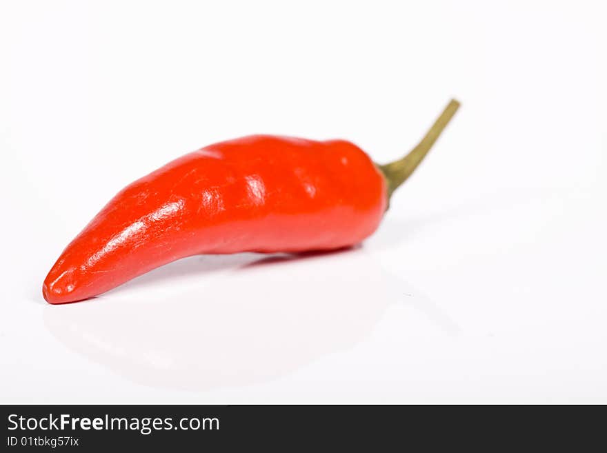 Red hot chili pepper on the white background