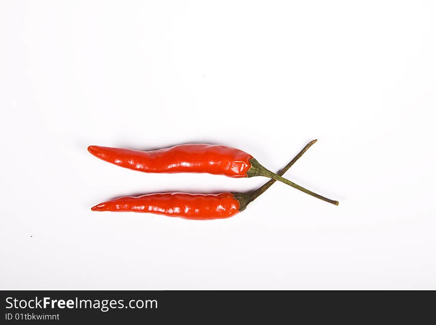 Red hot chili pepper on the white background