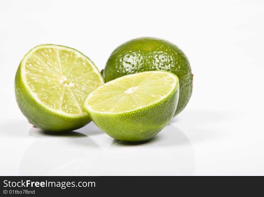 Fresh lime on the white background.