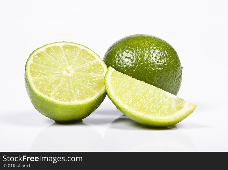 Fresh lime on the white background.