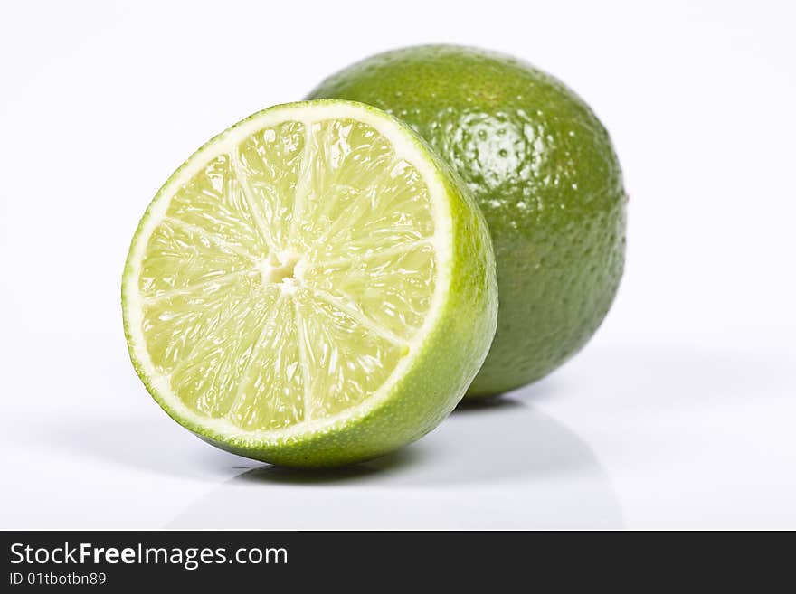 Fresh lime on the white background.