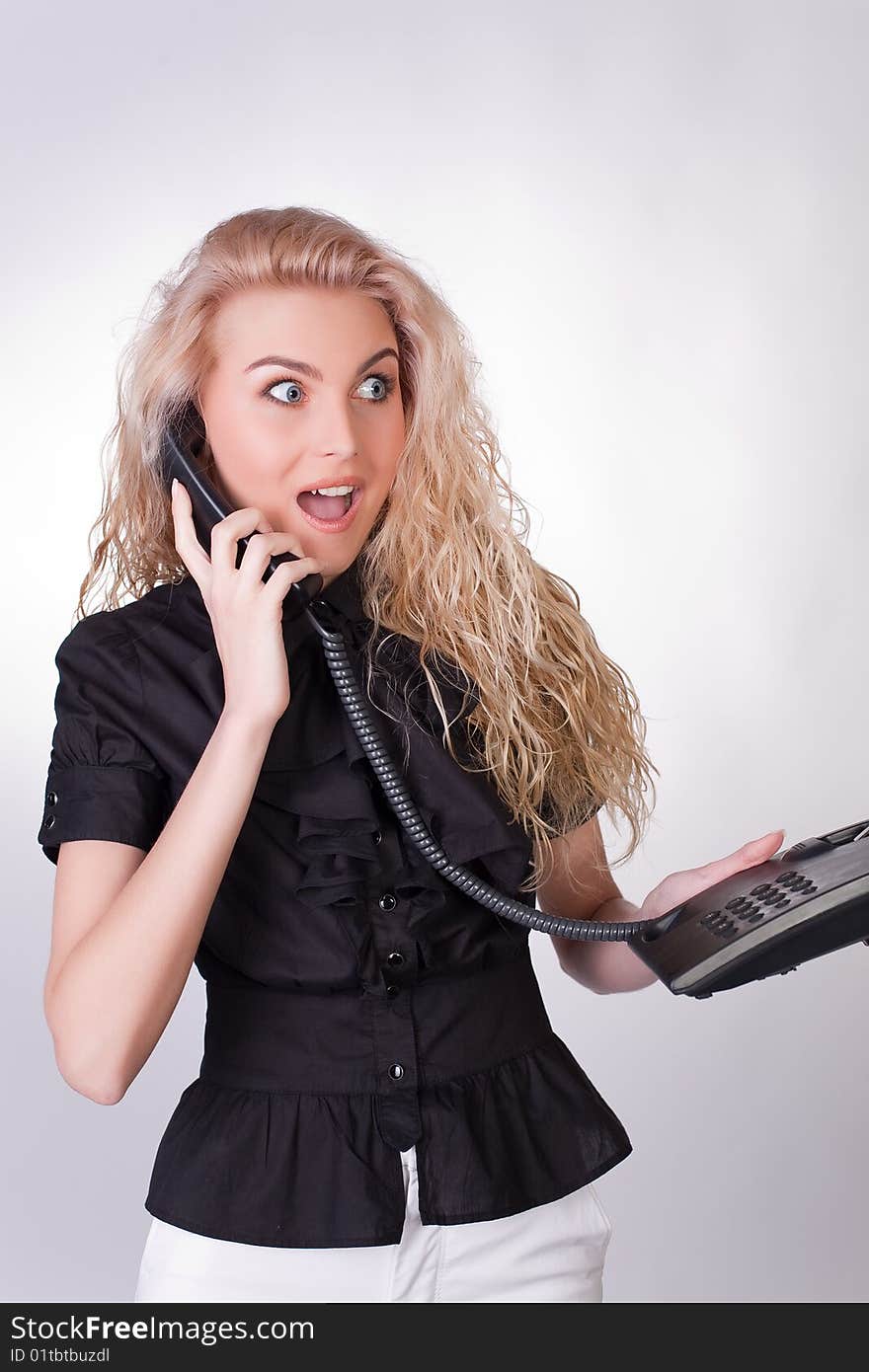 Surprised businesswoman, closeup studio shot