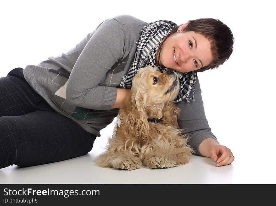 Girl and american cocker spaniel over a white background