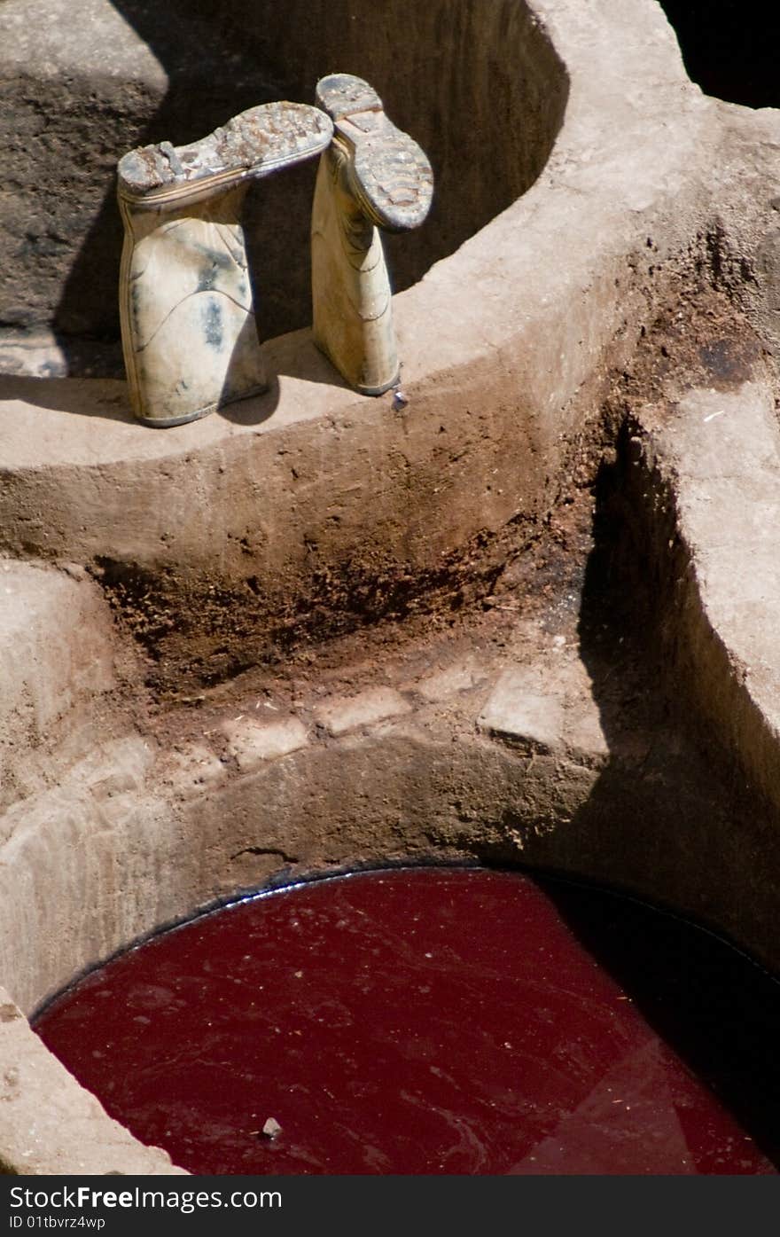 Tannery boots sitting on top of a tannery pool. Tannery boots sitting on top of a tannery pool