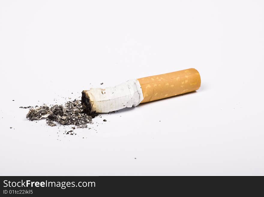 Cigarette on white background - isolated, smoking concept. Cigarette on white background - isolated, smoking concept