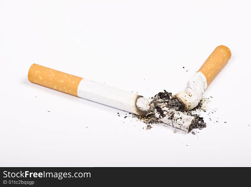 Cigarette on white background - isolated, smoking concept. Cigarette on white background - isolated, smoking concept