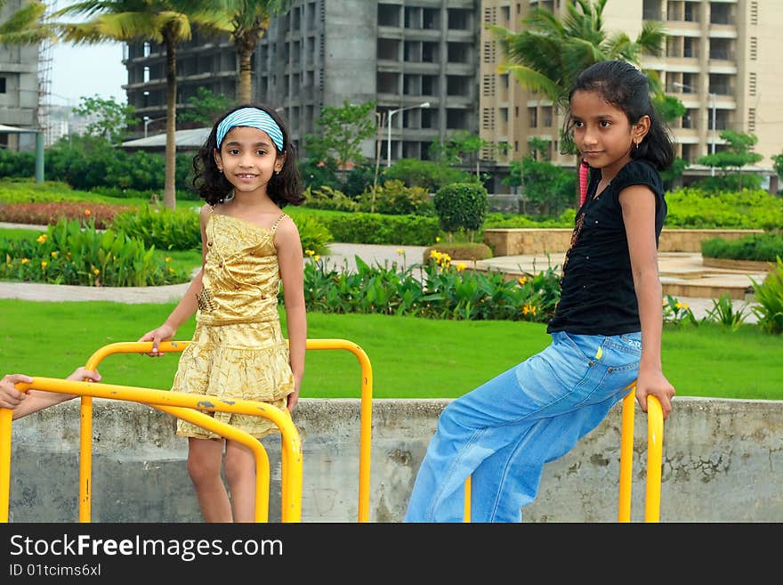 Two girls playing in park