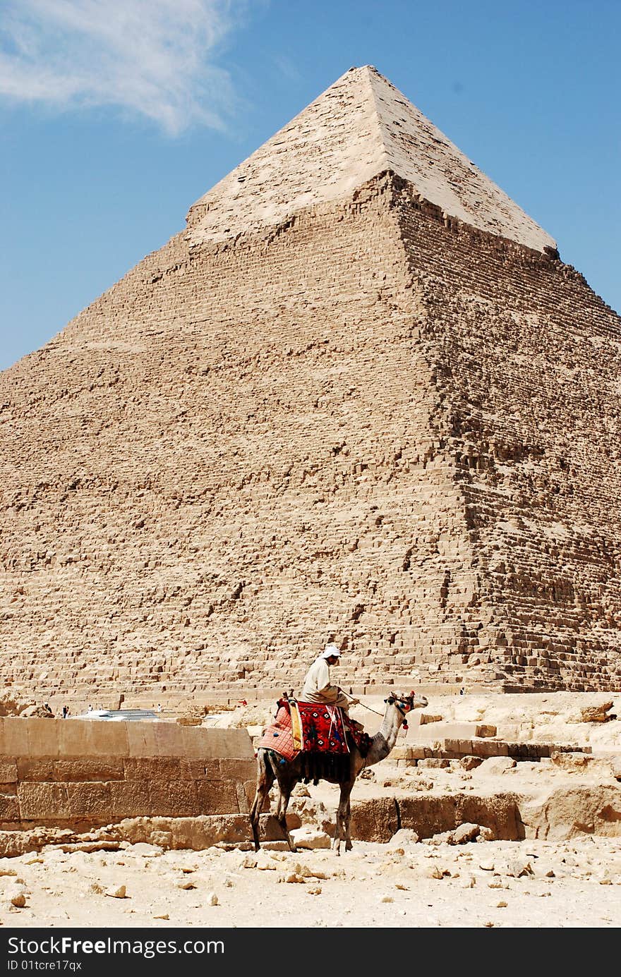 Great egyptian pyramid and man on the camel