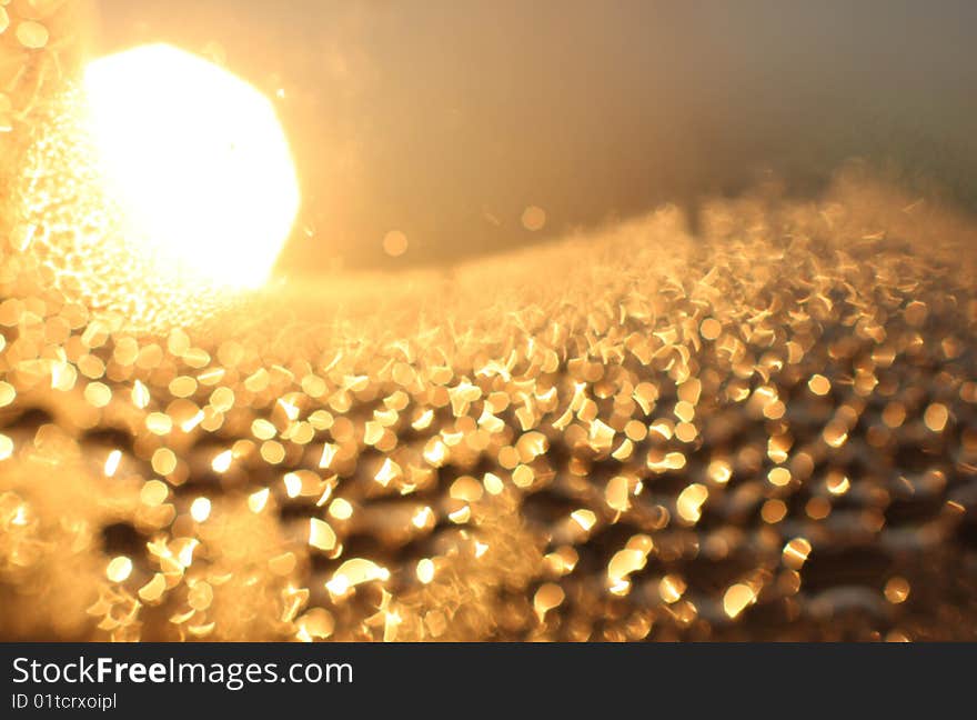 Defocused light dots bokeh background. Defocused light dots bokeh background