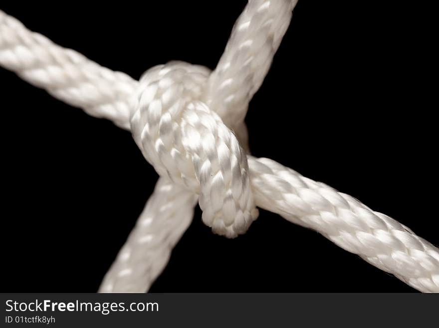 Nylon Rope Knot on a Black Background.