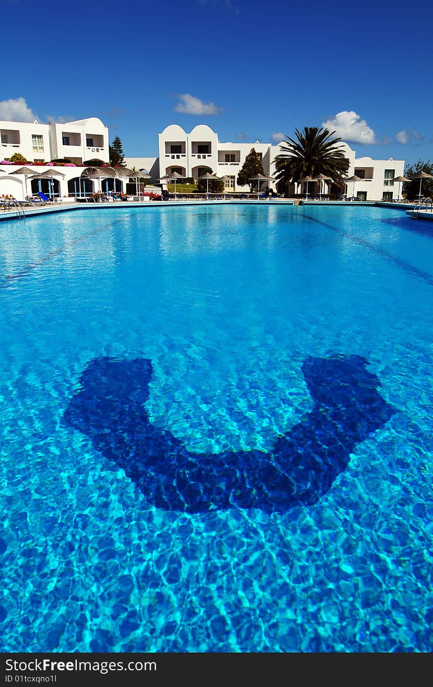 Beautiful blue swimming pool with white house. Beautiful blue swimming pool with white house