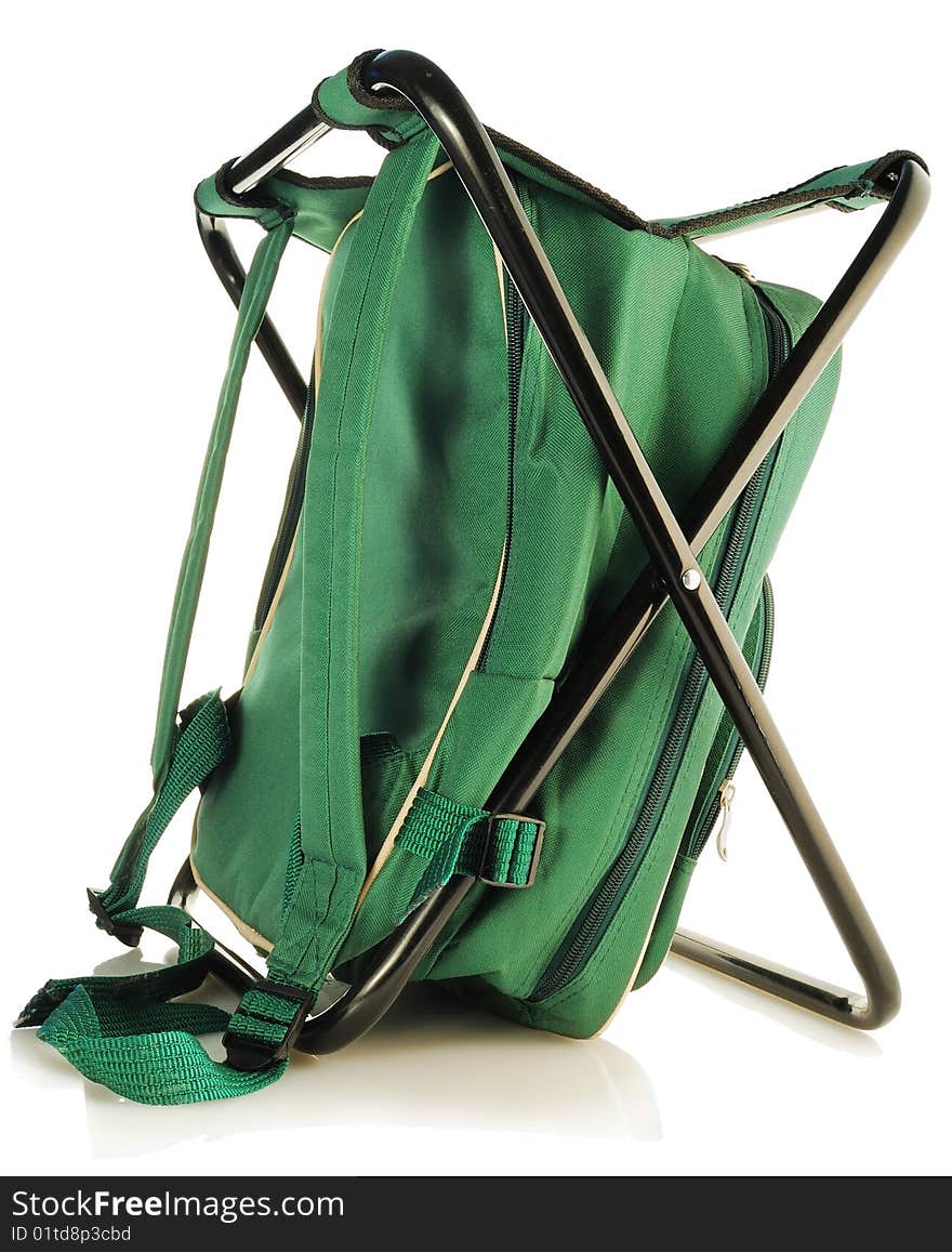 Set for a picnic in a green backpack