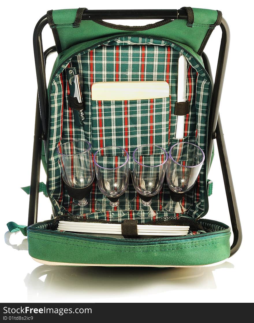 Set for a picnic in a green backpack