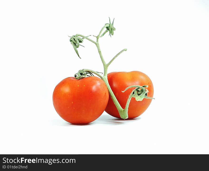 Beautiful fresh red tomato over white. Beautiful fresh red tomato over white