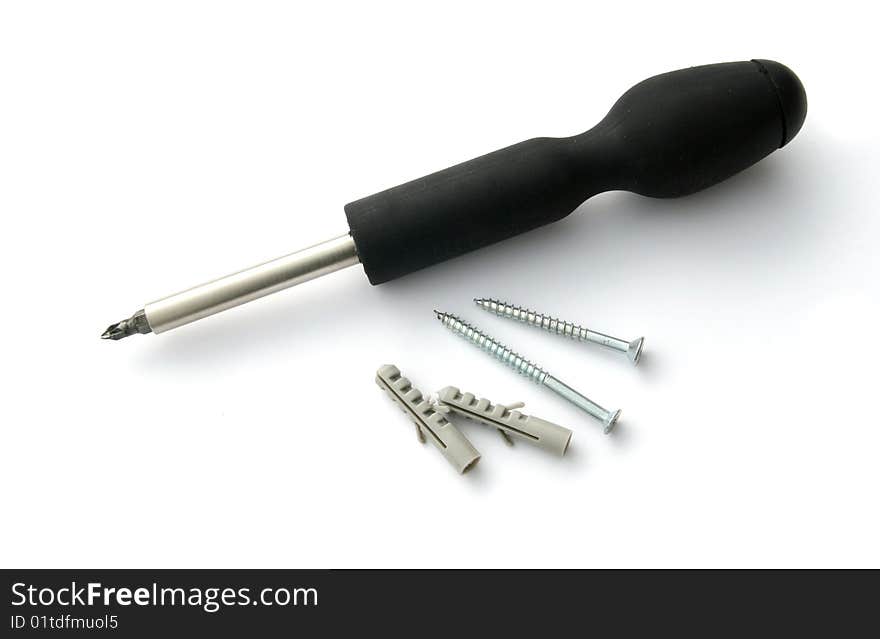 Screwdriver with screws and plugs