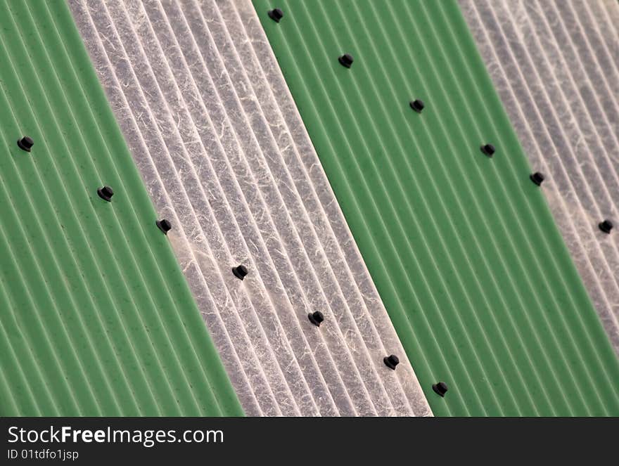 Grey and green metal roof