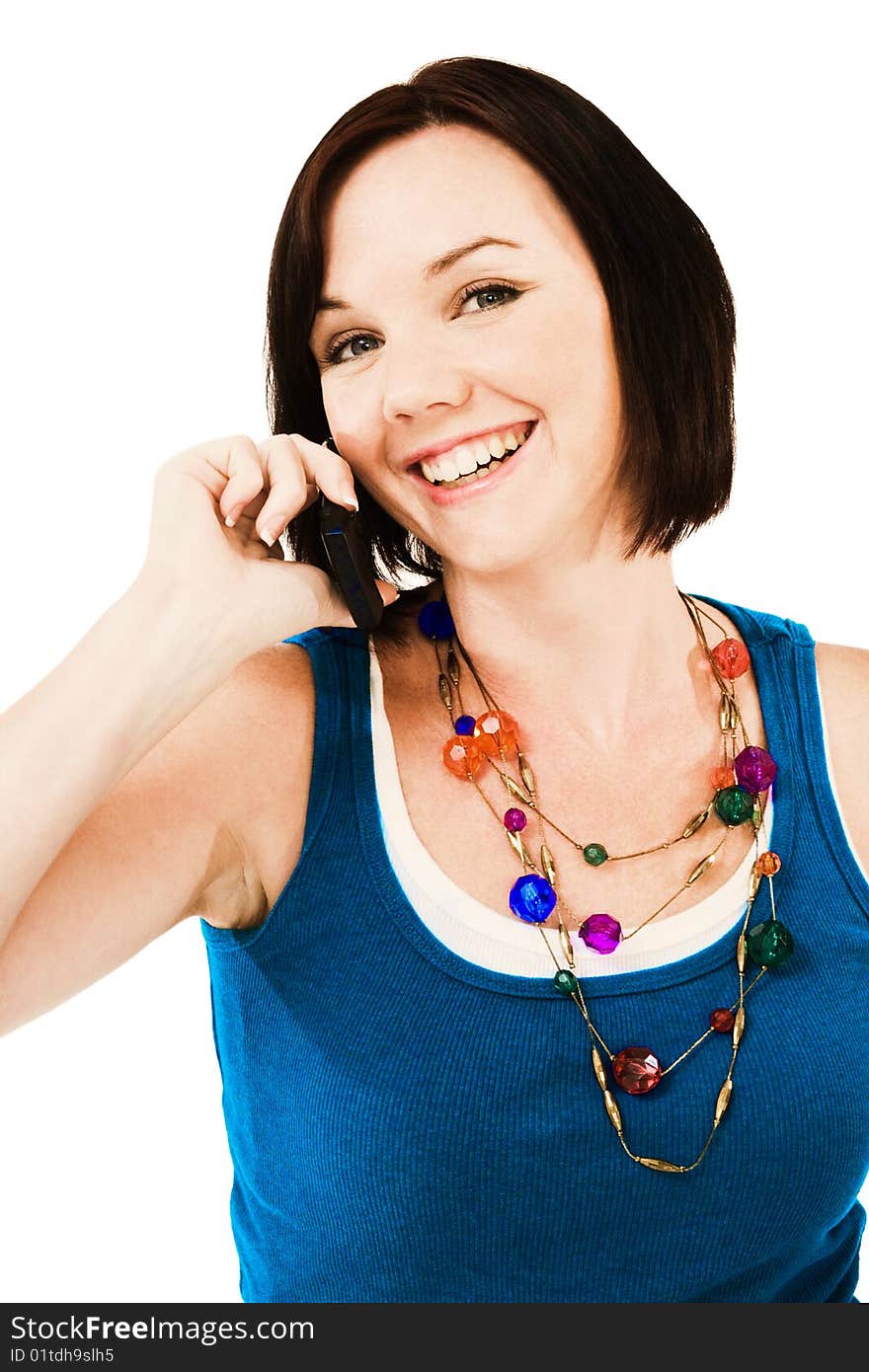 Portrait of a woman talking on a mobile phone isolated over white. Portrait of a woman talking on a mobile phone isolated over white