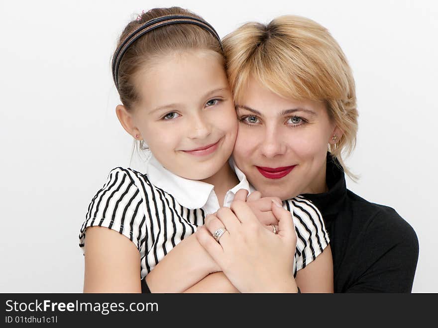 Portrait of mother with a daughter. Emotions