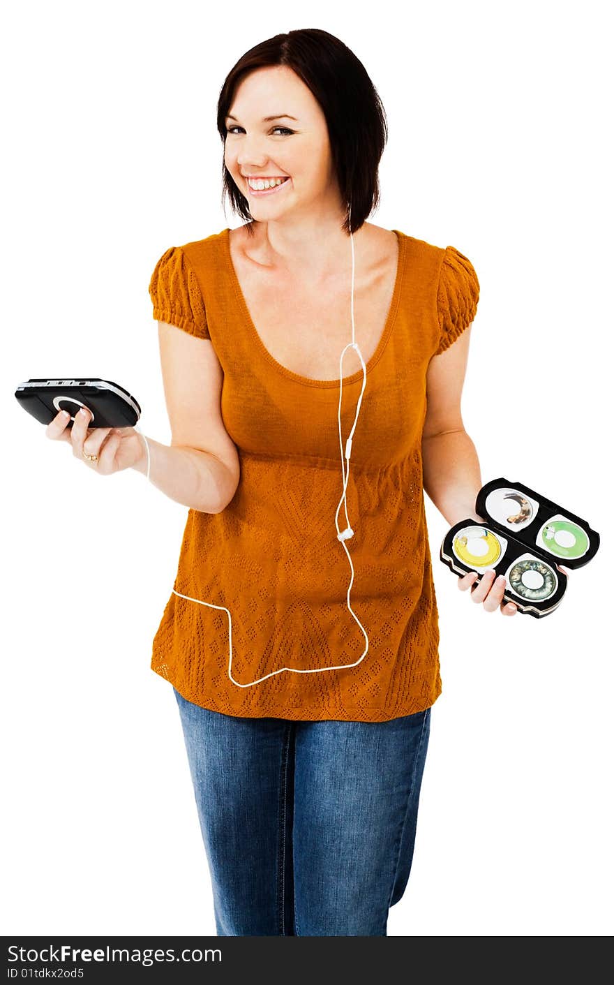 Caucasian woman listening to music on an media player isolated over white. Caucasian woman listening to music on an media player isolated over white