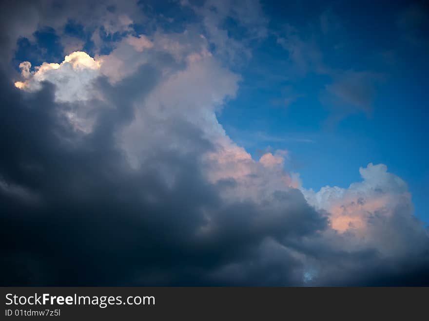 Clouds starting to build against a bright blue sky. Clouds starting to build against a bright blue sky.