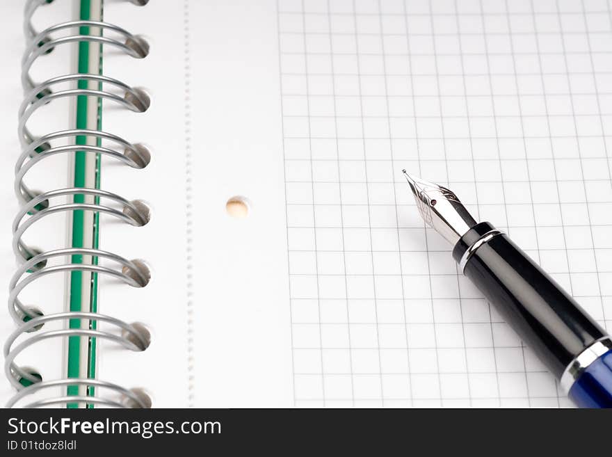 Close up of notebook and pencil on white background with clipping path