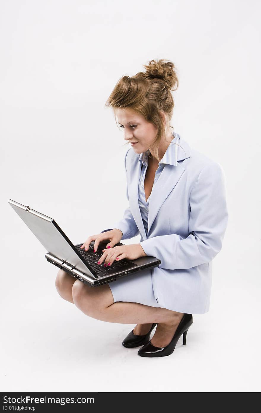 Young businesswoman, secretary or student with laptop, isolated. Young businesswoman, secretary or student with laptop, isolated