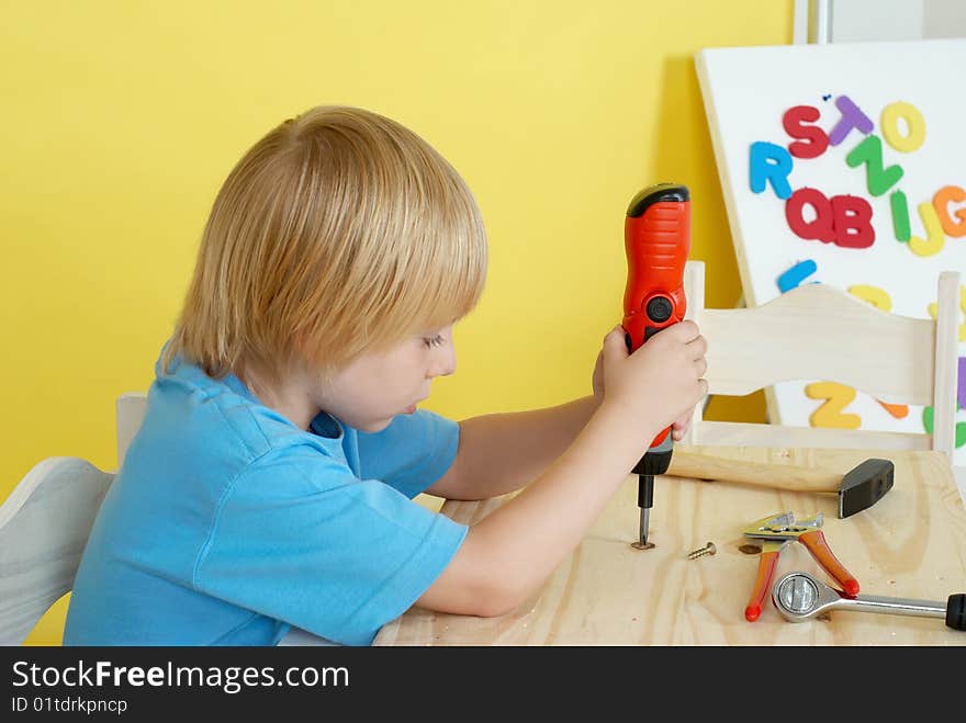 Little boy on creative lesson. Education