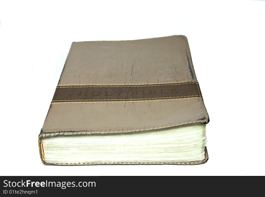 Old leather bible isolated over white. Old leather bible isolated over white