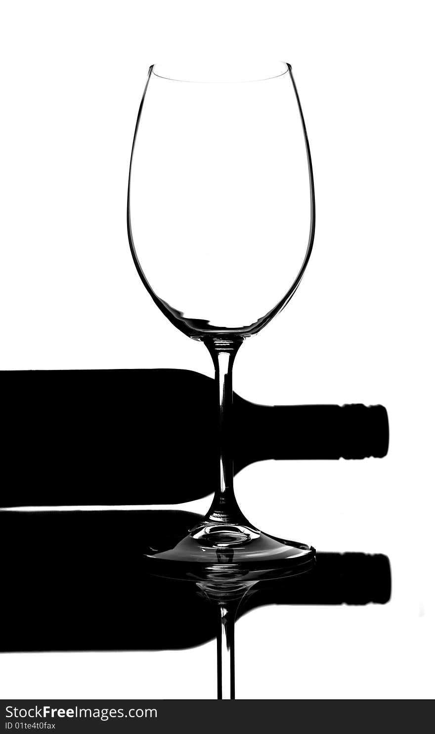 Silhouette isolation of wine glass and bottle. Silhouette isolation of wine glass and bottle