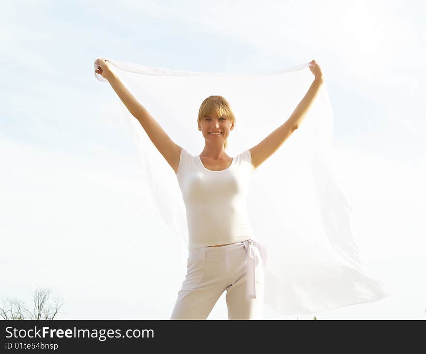 Session of a relaxation on a background of the years sky of the girl in white