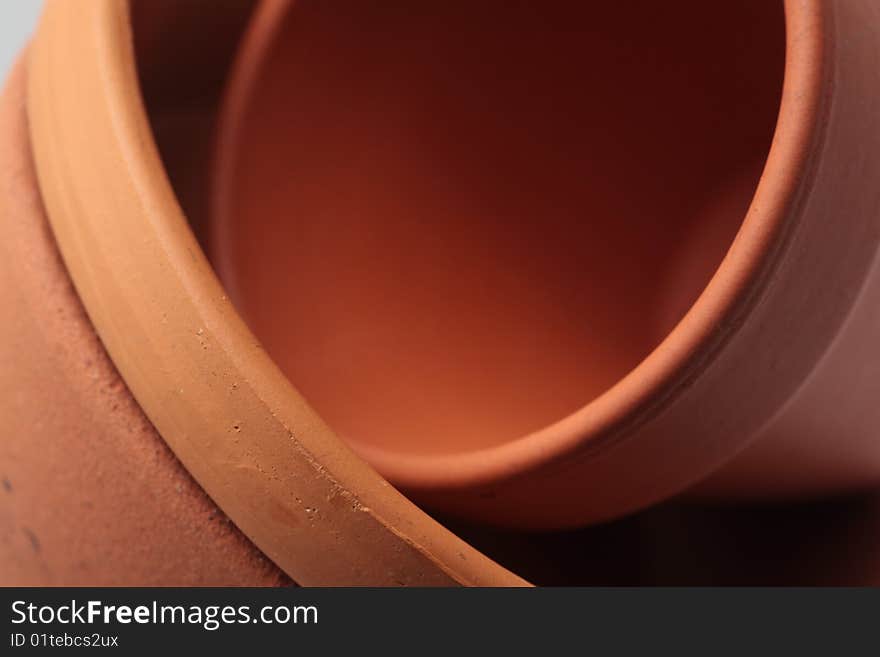 Terracotta pottery rounds pot close-up ceramic clay