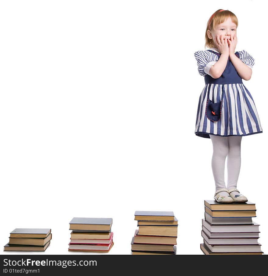 Little baby with books isolated on white background