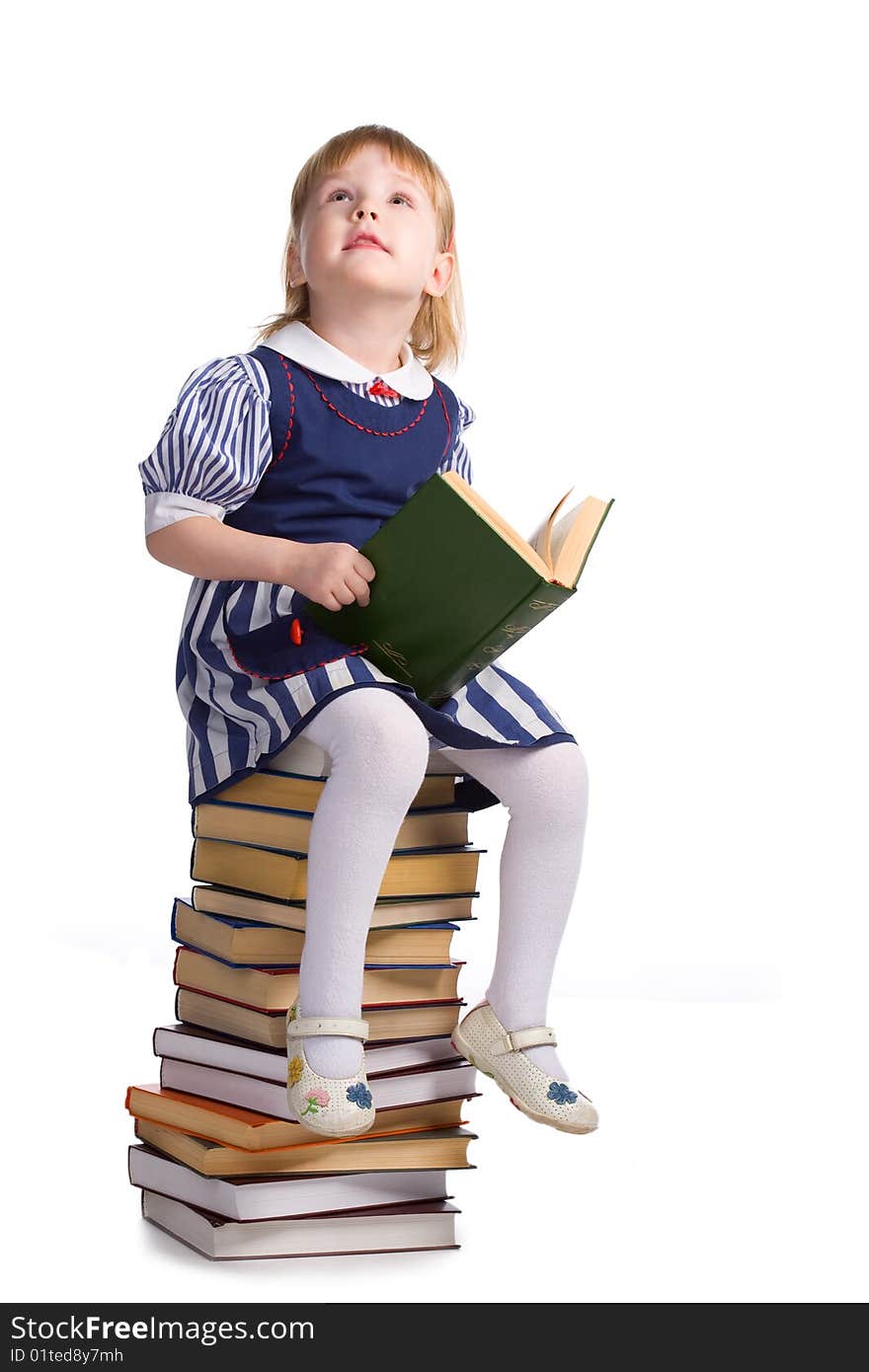 Little baby with books isolated on white background