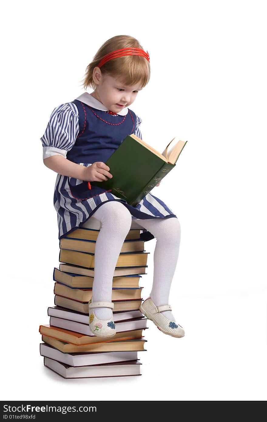 Little baby with books isolated on white background