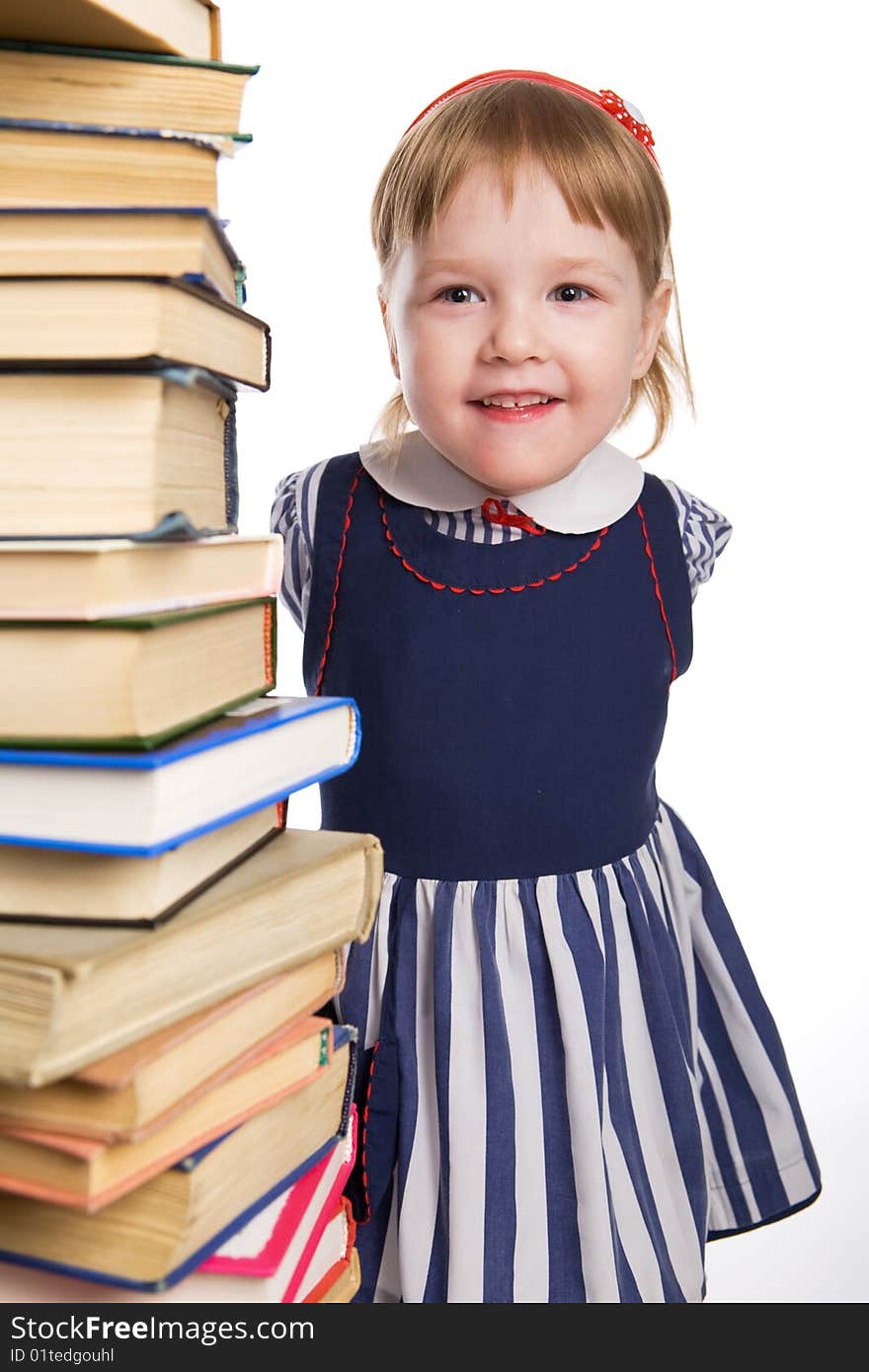 Little baby with books isolated