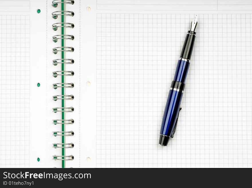 Close up of notebook and pencil on white background with clipping path